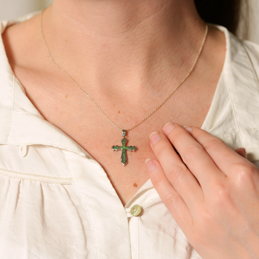 Opals & Ashes Decorative Cross Unisex Memorial Pendant Silver. Modelled on female. Ashes blended with Spring Green Opals.