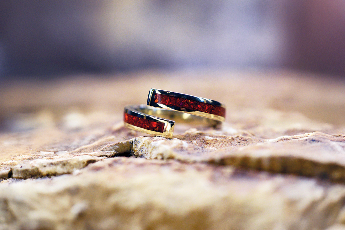 Opals & ashes Spiral ring Cast in 9ct Yellow gold filled with ruby red opals blended with our customers loved ones' ashes