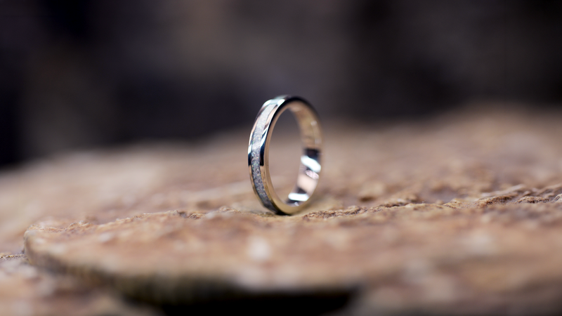 Circle Ashes Ring Cast in sterling silver filled with pearl white opals blended with customers loved one’s ashes.