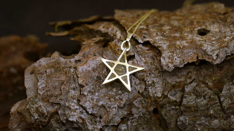 Five Star Ashes Pendant. Cast in 9ct Yellow Gold, Filled with gold flakes blended with customers loved one’s ashes.