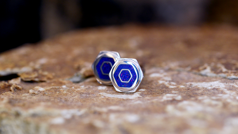 hexagon Ashes cufflinks. Cast in sterling Silver, filled with Royal Blue opals blended with customers loved one’s ashes.