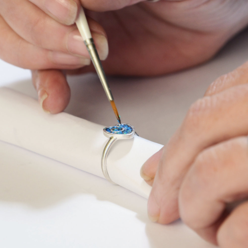 How it's made. Infilling and Opals & Ashes Spiral Heart Ring with Pacific Blue Opals and our customers loved ones' ashes