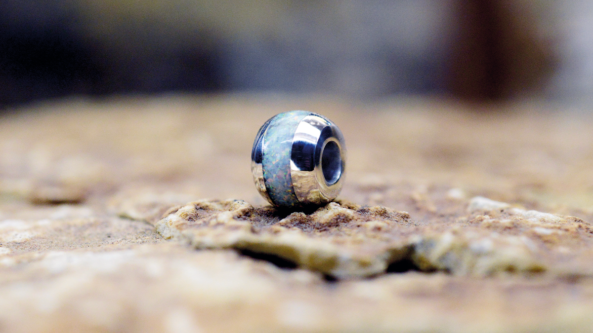 Memorial Ashes Charm. Cast in Serling Silver, filled with Pearl White opals blended with our customers loved one’s ashes.

