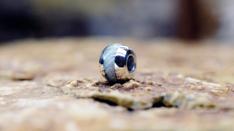 Memorial Ashes Charm. Cast in Serling Silver, filled with Pearl White opals blended with our customers loved one’s ashes.

