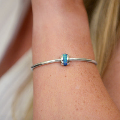 Opals & Ashes Memorial Charm modelled on Pandora bracelet. Sterling Silver with pacific blue opals blended with cremation ashes
