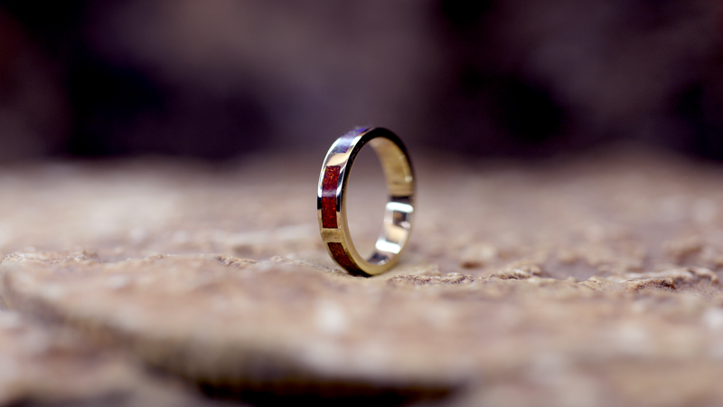 Rainbow Ashes Ring Cast in 9ct yellow gold filled with opals blended with customers loved one’s ashes.