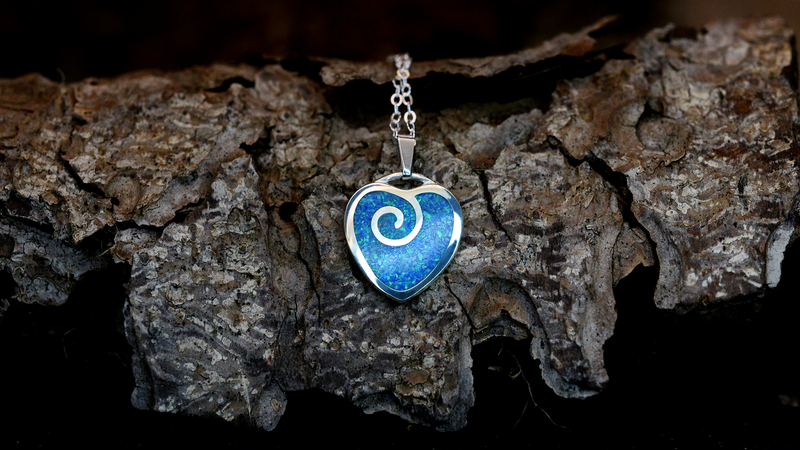 handmade ashes necklace UK cremation jewellery. Spiral Heart Pacific blue