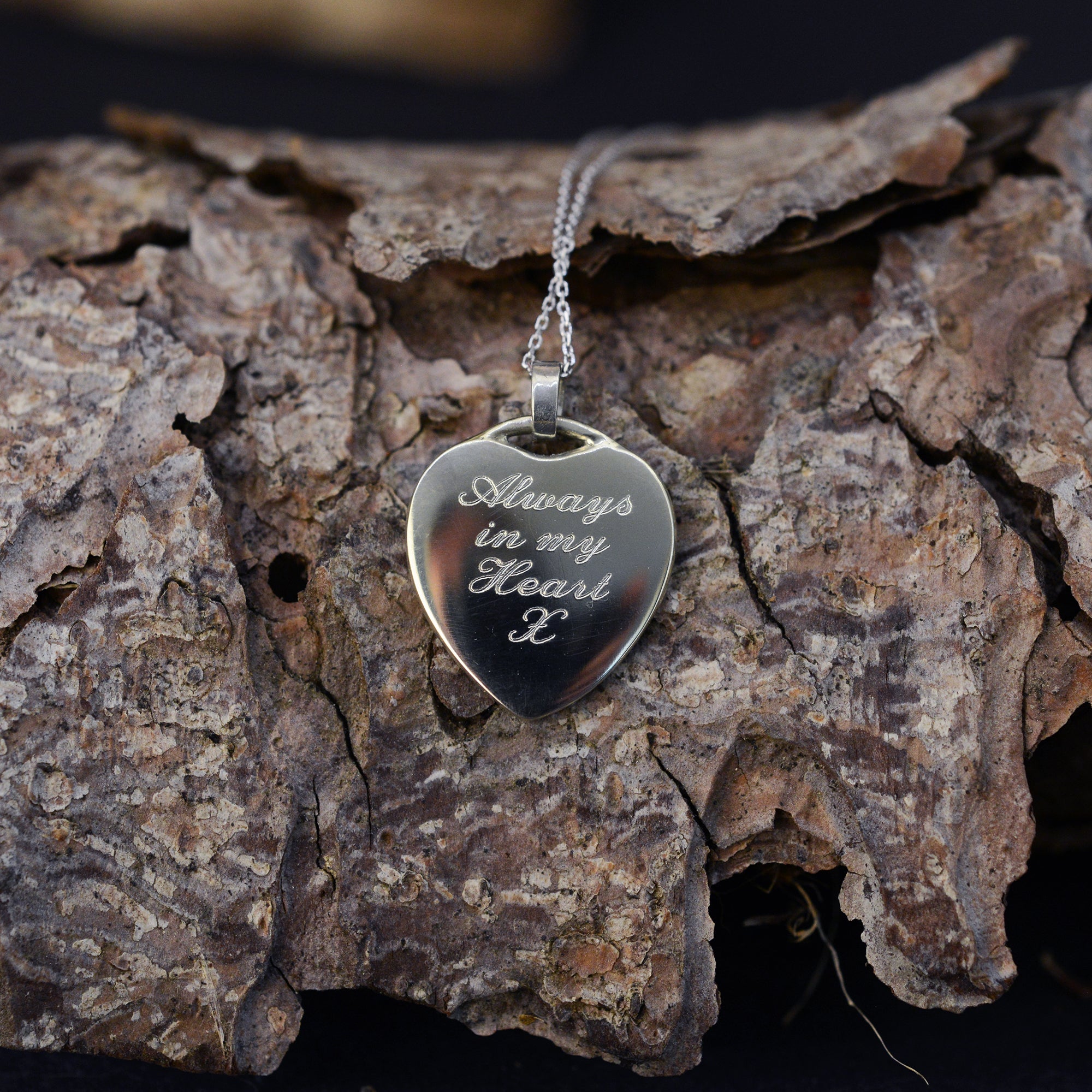 handmade ashes heart necklace UK cremation jewellery. Hand engraved