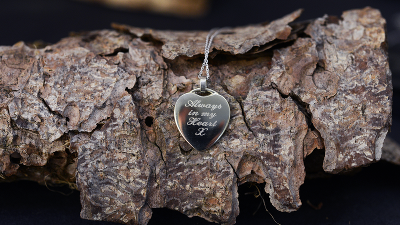 handmade ashes heart necklace UK cremation jewellery. Hand engraved