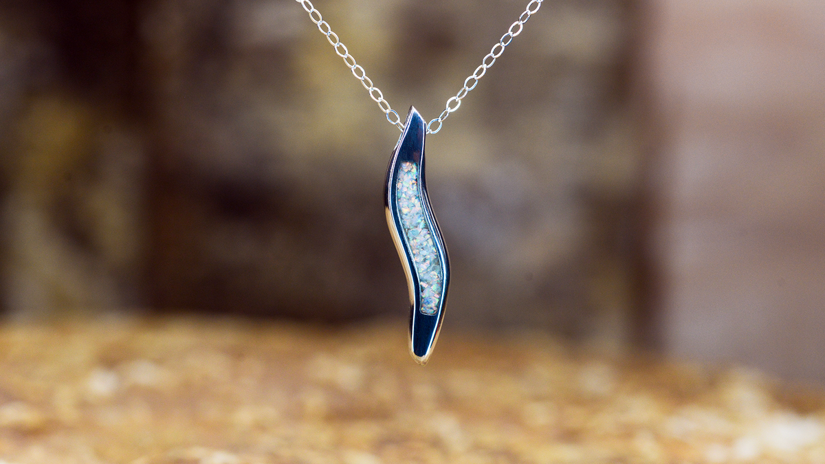 handmade ashes wave necklace UK cremation jewellery. 