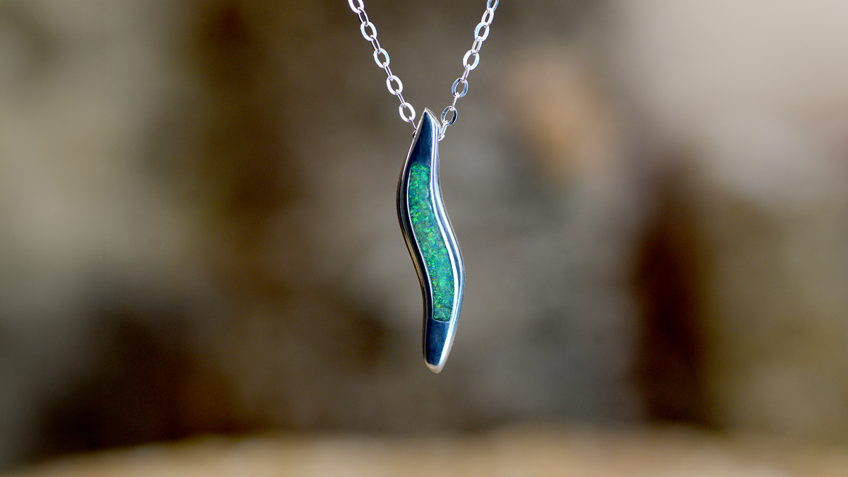 handmade ashes wave necklace UK cremation jewellery. 